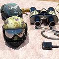 Military Tactical Gear Collection Featuring Camouflage Helmets Binoculars Radio And Detection Equipment