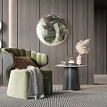 Green Accent Chair with Pillow Blanket and Ottoman by Wooden Wall Round Mirror
