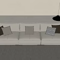 Modern Three Seater Sofa in Beige with Throw Pillows Black Floor Lamp and Side Table