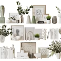 Decorative Ornament Collection With Green Plants Picture Frames Sculptures Books And Vases