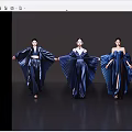 Women Modeling Blue Dresses With Large Pleated Skirts On Dark Reflective Floor