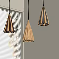 Three Conical Pendant Lights With Striped Design And Golden Finish In Room Near Window Blinds