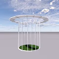 White Circular Pavilion With Vertical Pillars Green Grass Under Blue Sky And White Clouds