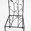 Elegant Intricate Carved Iron Chair With Vine Pattern Backrest Design
