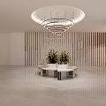 Modern Leisure Area Interior with Circular Layered Chandeliers Green Plant Centerpiece and Wooden Slat Walls