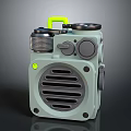 Light Green Portable Speaker With Yellow Handle Top Knob And Front Grille