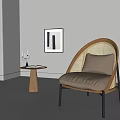 Modern Leisure Chair with Rattan Weave and Wooden Frame Beige Cushion Side Table Candles Book