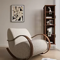 Cream Upholstered Accent Chair With Curved Wooden Arms Decorative Bookshelf And Wall Art