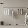 Minimalist Clothing Display Setting With Hanging Clothes Dresses Mannequin Shoes And Hat