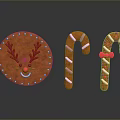 Antler Decorated Gingerbread Cookie With Smiley Face And Red White Striped Candy Canes With Icing