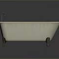Elegant White Freestanding Bathtub With Brass Faucet And Stylish Brass Feet Design