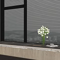 Cozy Bay Window Seating Area With White Blinds Green Plant And Wooden Bench