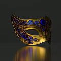 Ornate Golden Mask With Blue Gemstone Intricate Decorative Patterns And Classic Design