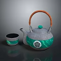Gray And Green Tea Set With Woven Orange Handle Teapot Decorative Pattern And Matching Teacup