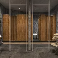 Modern Public Restroom Featuring Bamboo Stalls Marble Accents Gray Stone Walls And Plants