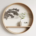 Circular Wooden Frame Wall Decor Featuring Ink Tree Branch Vase Green Leaves And Small Boat