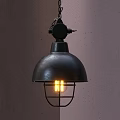 Industrial Black Metal Pendant Light With Dome Shade Metal Cage And Lit Bulb On Wall