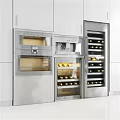 Modern Kitchen Interior With Built in Stainless Steel Wine Coolers And Appliances