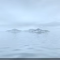 Scenic View of Calm Water with Gentle Ripples Distant Misty Islands in Hazy Light Blue