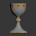 Ornate Silver Goblet With Gold Rim And Red Gemstone Accents