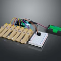 DIY Electronic Device With Wooden Clamps Circuit Board And Battery Pack