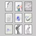 Abstract Artworks With Various Designs In Black Frames Arranged As Wall Decor
