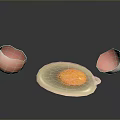 Fresh Fried Egg With Yolk And Broken Egg Shells On Dark Surface