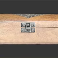 Wooden Decorative Box With Intricate Carved Pattern And Metal Clasp Design