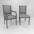 Ornate Black Leather Dining Chairs With Gold Accents And Armrest Details