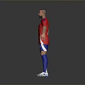 Man With Mohawk Hairstyle In Red Soccer Jersey Number 8 Blue Shorts And Tattoos