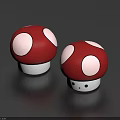 Two Red Mushroom Shaped Dolls With White Spots And Smiling Faces 3d model