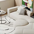 Beige L shaped Sectional Sofa In Living Room With Area Rug Side Table And Artwork