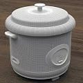 Oster Electric Rice Cooker With White Body And Black Lid On Kitchen Countertop