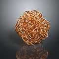 Copper Wire Spherical Sculpture With Intertwined Metal Design And Reflection On Dark Background