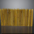 Yellow Wooden Fence With Pointed Tops And Vertical Slats On Gray Background