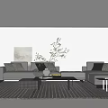Modern Living Room Sofa Coffee Table Set With Light Colored Throw Pillows And Green Plant Decor