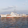 White Warship With Red Bottom Sailing On The Sea Under Clear Sky