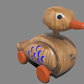 Wooden Toy Duck With Orange Beak Wheels And Blue Fish Scale Design