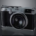 Vintage Retro Design Electronic Camera With Classic Lens And Metal Body