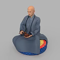 Bald man in gray robe sitting cross-legged on colorful cushion holding wooden bowl