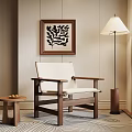 Comfortable Wooden Frame Lounge Chair With White Cushion Side Table Floor Lamp And Decorative Painting