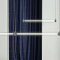 Modern Linear Pendant Light With Sleek Metal Frame Against Navy Blue Curtains And White Background