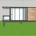 Contemporary Hillside Home With Wooden Exterior And Large Glass Windows On Grassland