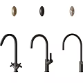 Three Black Curved Kitchen Faucets With Gold Black Silver Handles