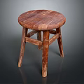 Rustic Wooden Stool With Round Seat Four Legs And Natural Wood Grain Design