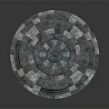 Circular Stone Constructed Fountain With Central Blue Basin Surrounding Steps And Slab Floor