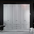 Modern White Wardrobe Interior Design With Multiple Doors Drawers Against Dark Wall