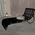 Black Rattan Lounge Chair With White Cushion Gray Wall Floor Lamp And Green Plant