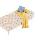Tufted Gray Sofa Bench With Gold Legs Yellow Blanket And Blue Cushion