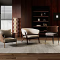 Modern Accent Chairs in Living Space With Wooden Shelves Floor Lamp and Rug